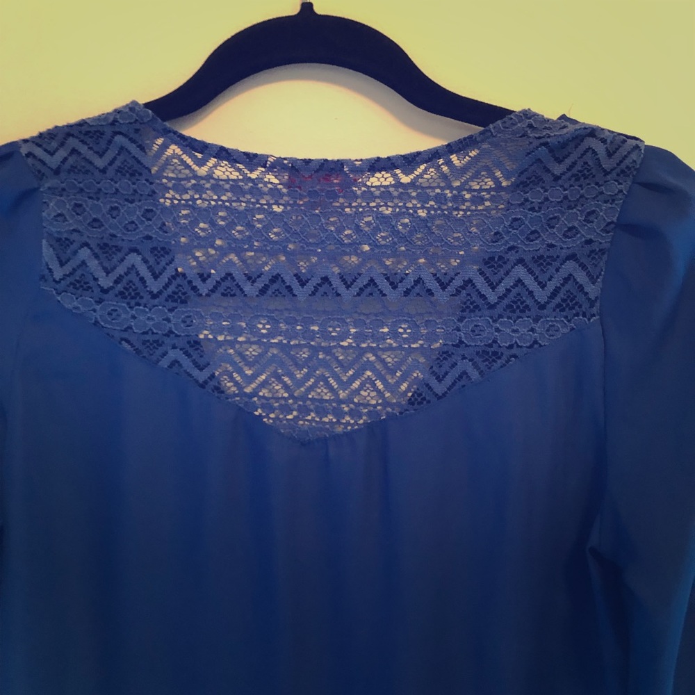 Royal blue blouse.